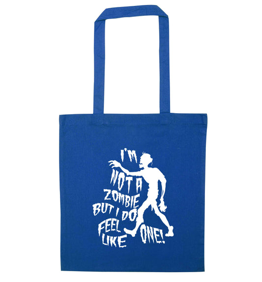 I'm not a zombie but I do feel like one! blue tote bag
