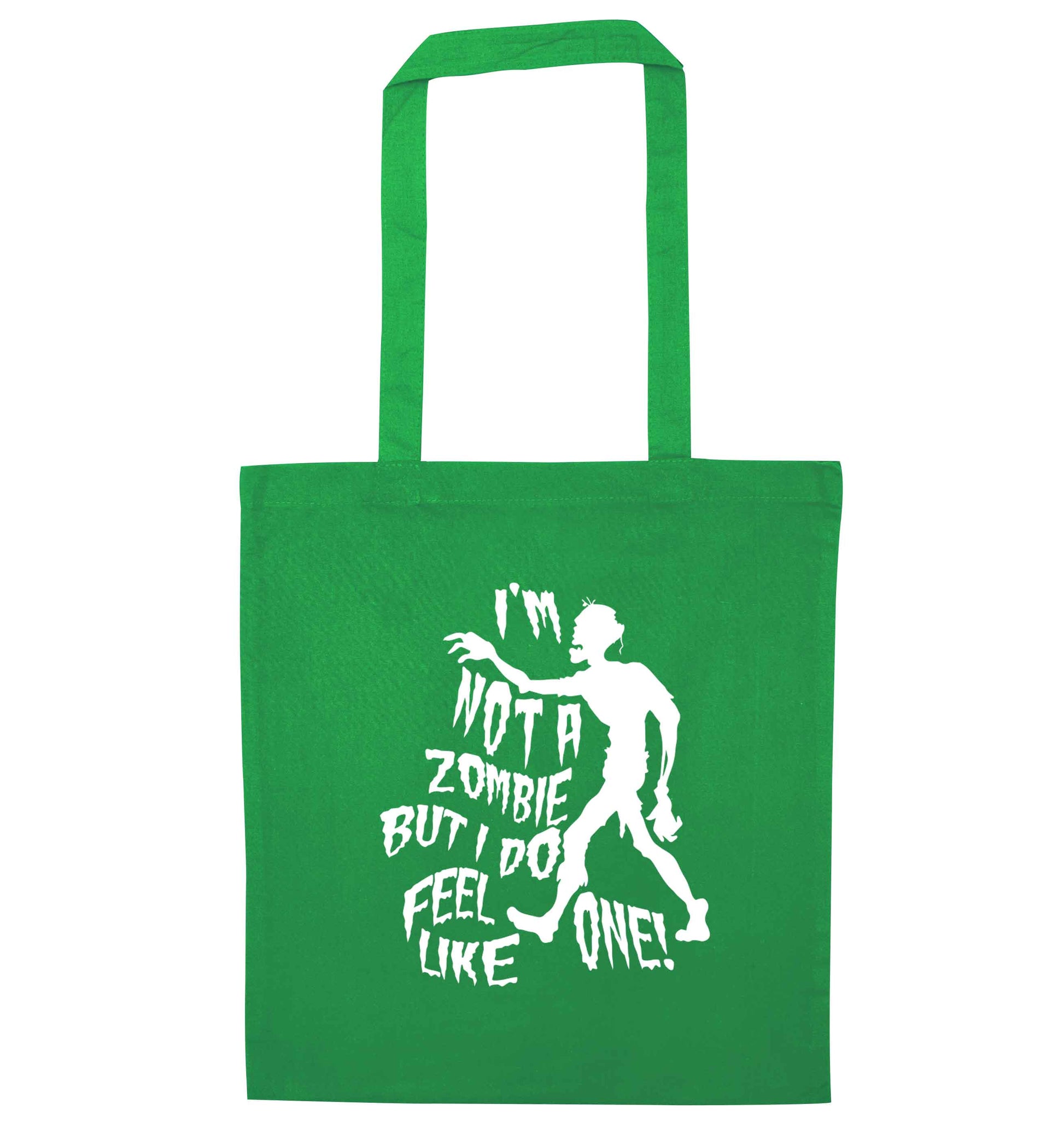 I'm not a zombie but I do feel like one! green tote bag