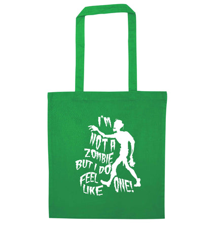 I'm not a zombie but I do feel like one! green tote bag