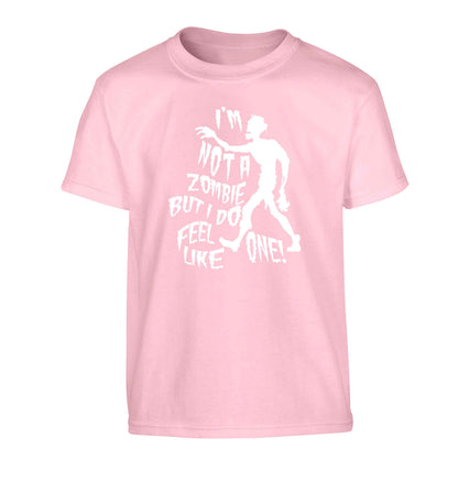 I'm not a zombie but I do feel like one! Children's light pink Tshirt 12-13 Years