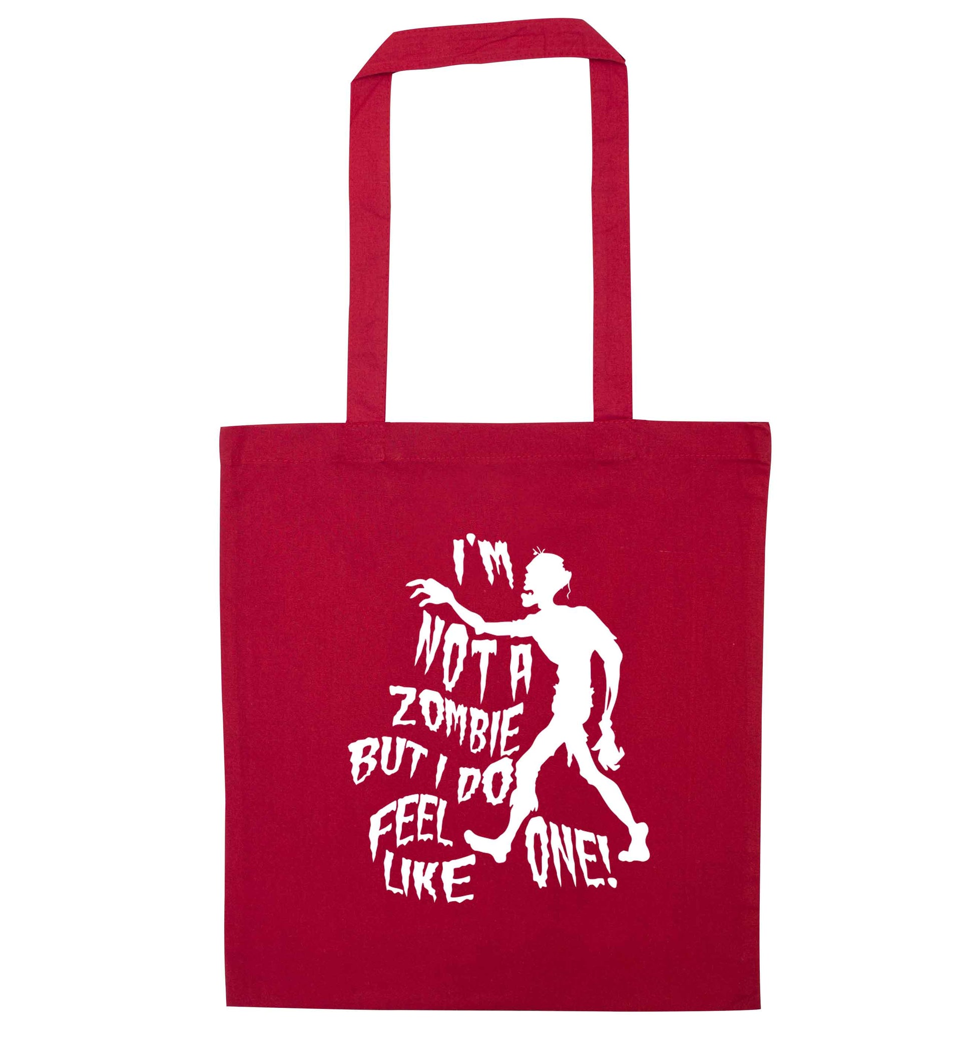I'm not a zombie but I do feel like one! red tote bag