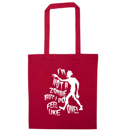 I'm not a zombie but I do feel like one! red tote bag