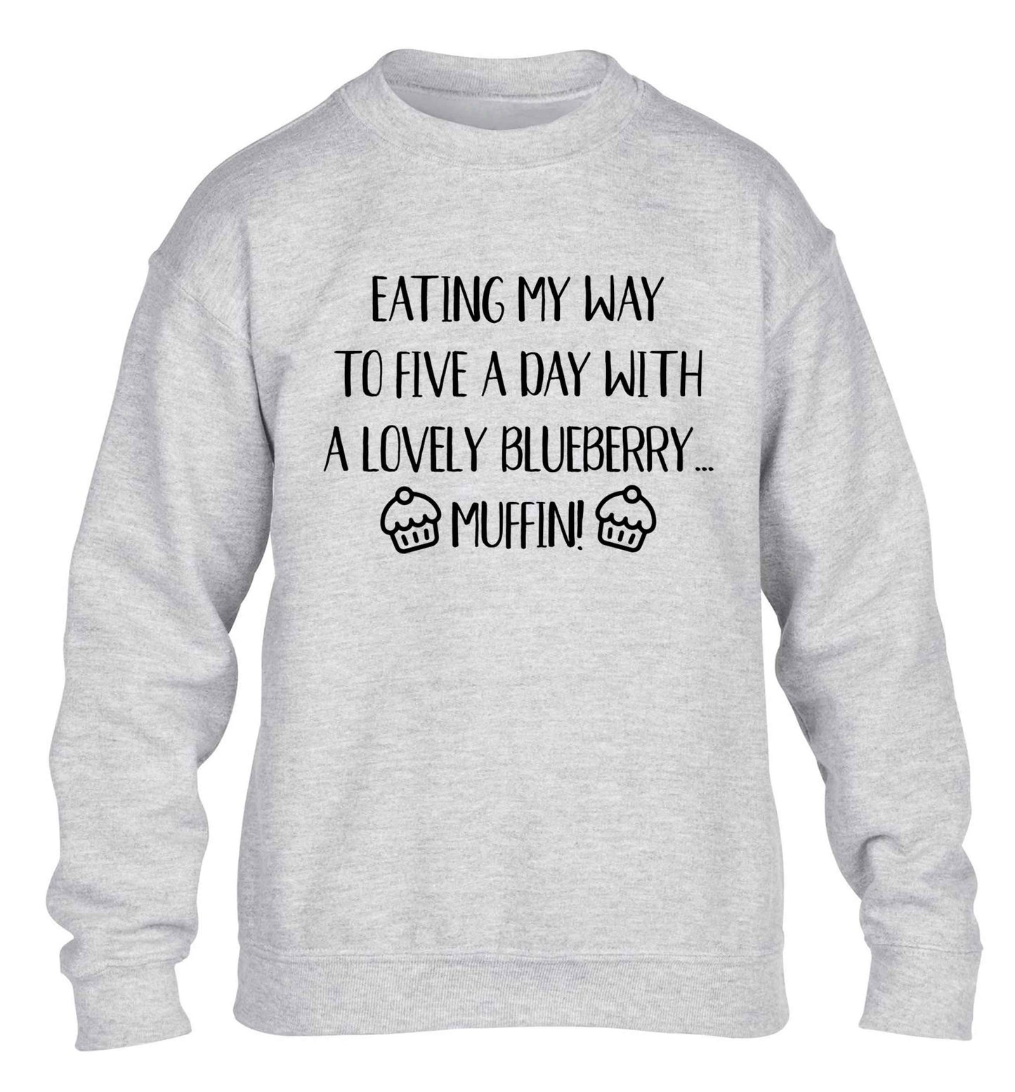 Eating my way to five a day with a lovely blueberry muffin children's grey sweater 12-13 Years