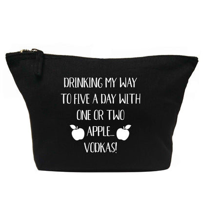 Drinking my way to five a day with one or two apple vodkas | makeup / wash bag