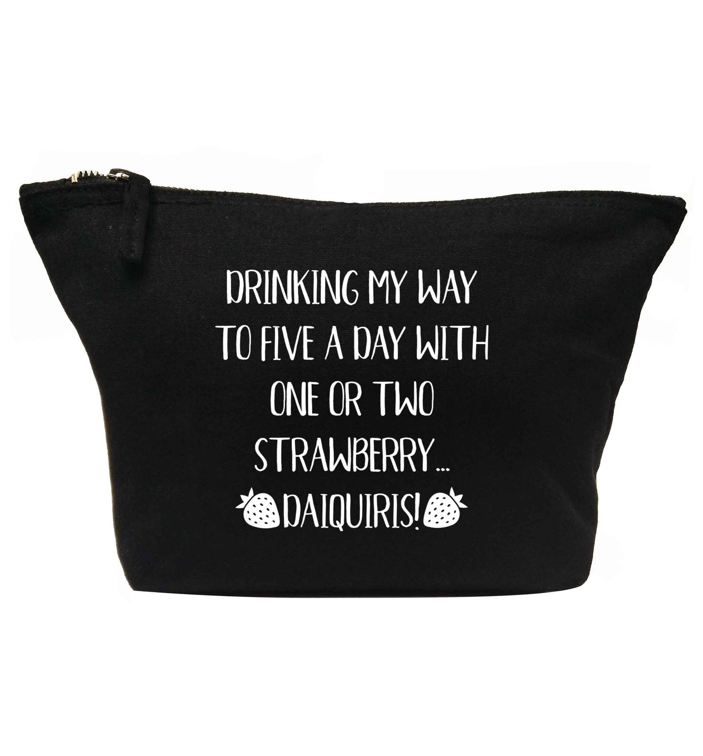 Drinking my way to five a day with one or two straberry daiquiris | makeup / wash bag