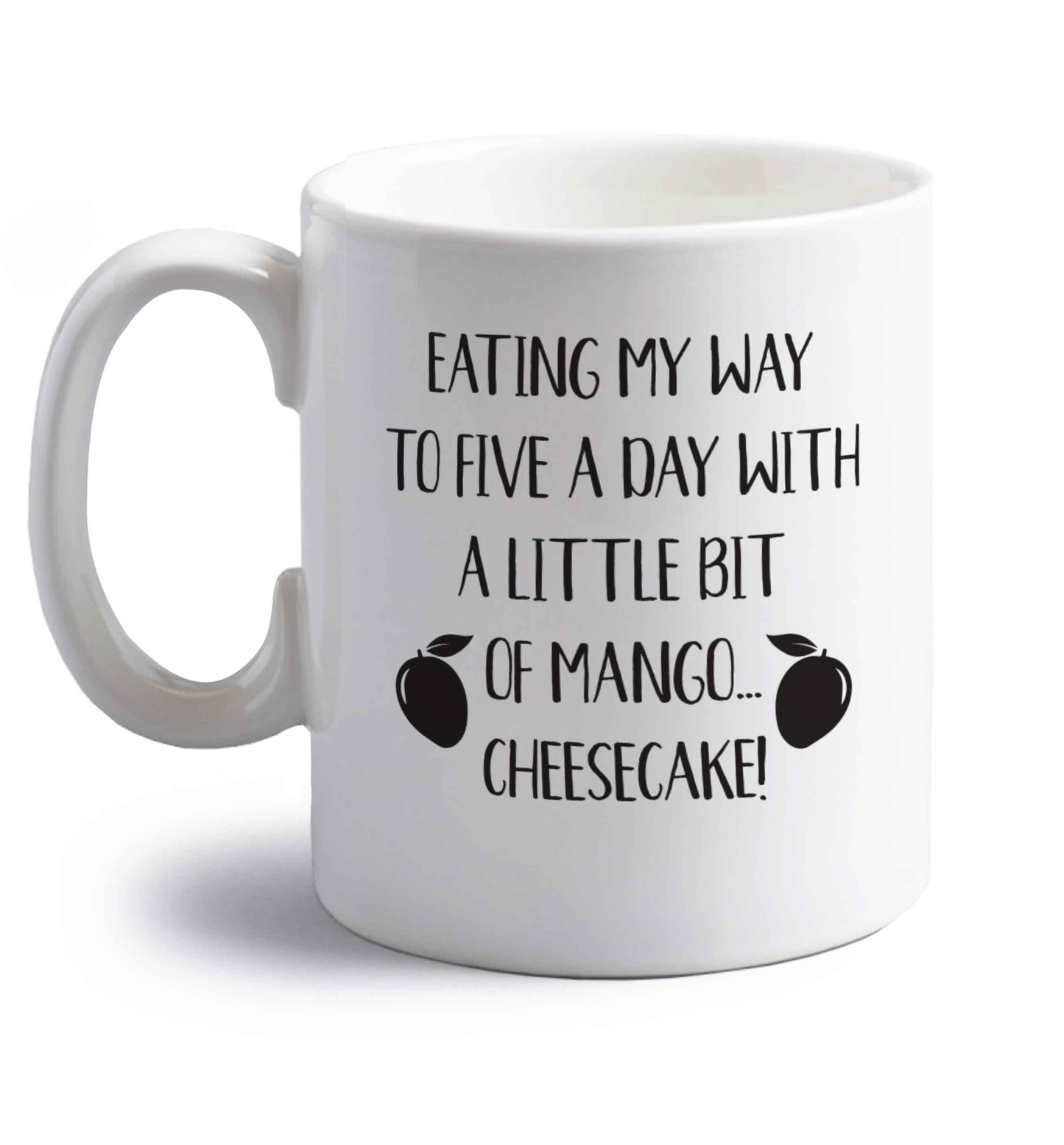 Eating my way to five a day with a little bit of mango cheesecake right handed white ceramic mug 