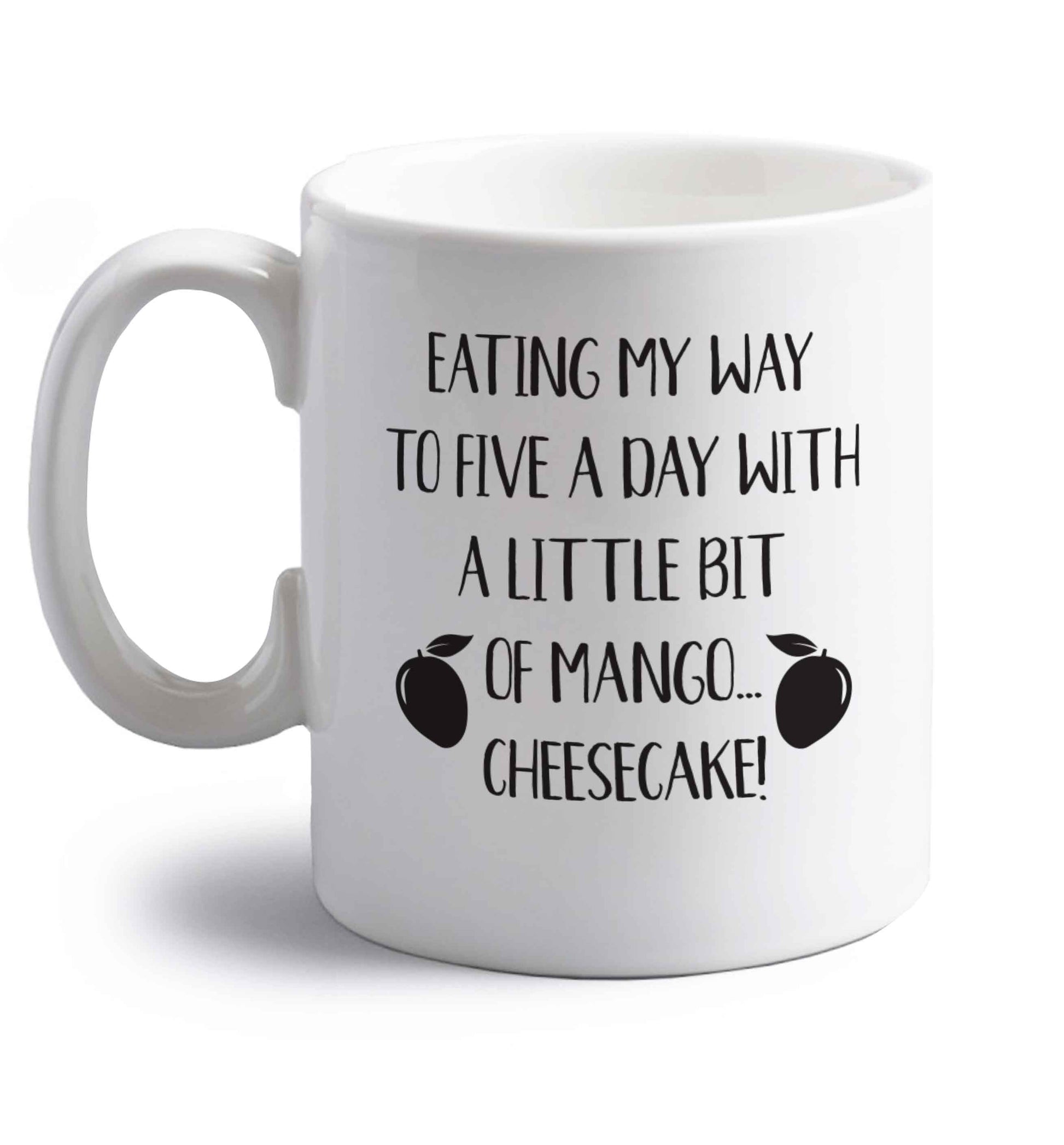 Eating my way to five a day with a little bit of mango cheesecake right handed white ceramic mug 