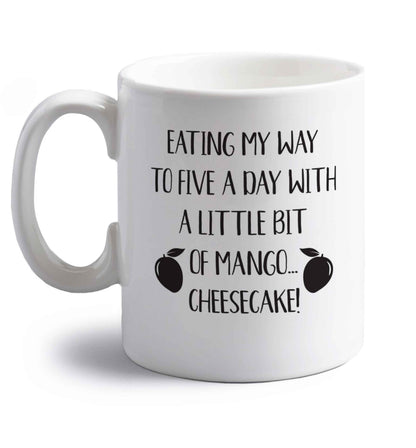 Eating my way to five a day with a little bit of mango cheesecake right handed white ceramic mug 