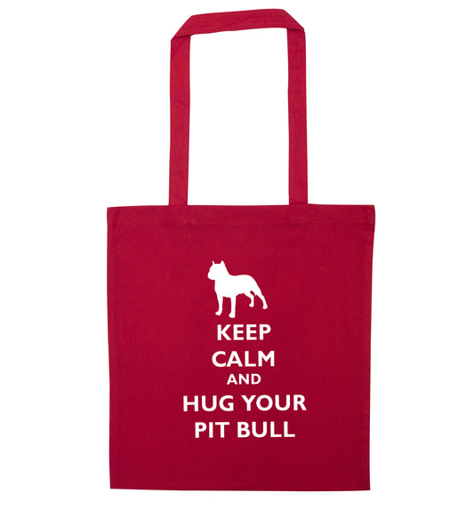 Keep calm and hug your pitbull red tote bag