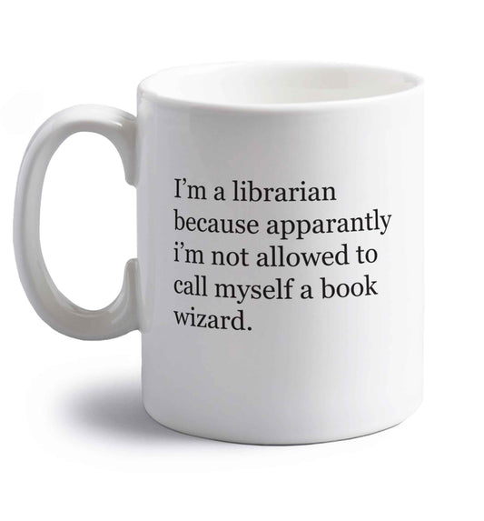 iÃ•m a librarian because apparantly iÃ•m not allowed to call myself a book wizard right handed white ceramic mug 