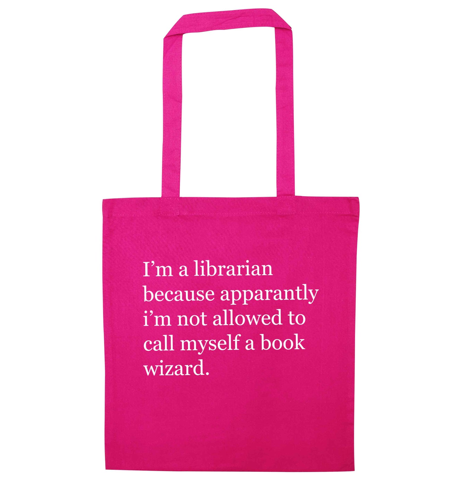 i√ïm a librarian because apparantly i√ïm not allowed to call myself a book wizard pink tote bag