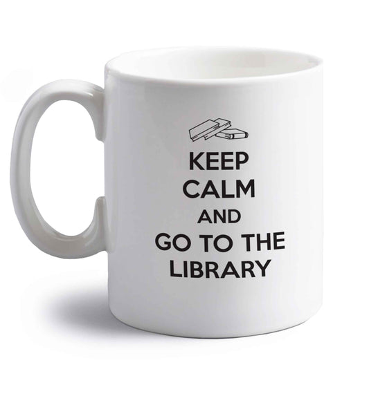 Keep calm and go to the library right handed white ceramic mug 