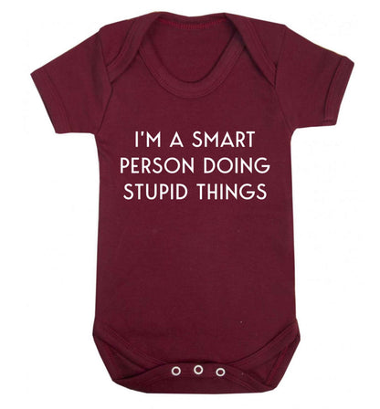 I'm a smart person doing stupid things Baby Vest maroon 18-24 months