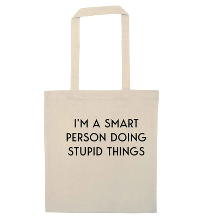 I'm a smart person doing stupid things natural tote bag