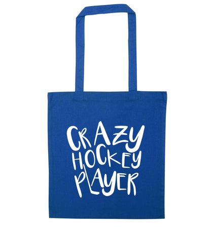 Crazy hockey player blue tote bag