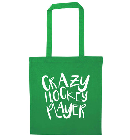Crazy hockey player green tote bag