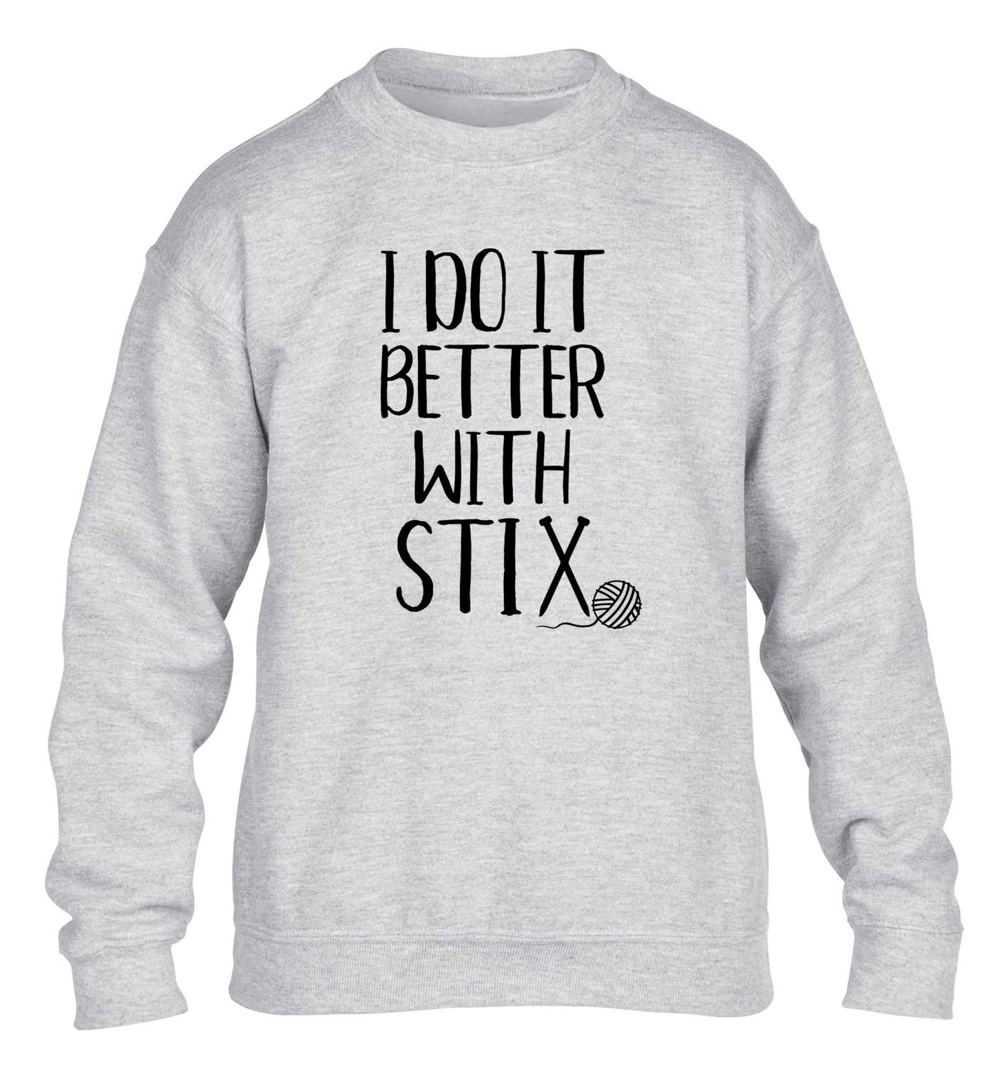I do it better with stix (knitting) children's grey sweater 12-13 Years