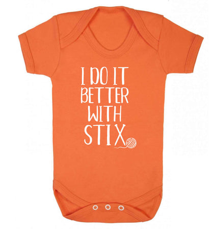 I do it better with stix (knitting) Baby Vest orange 18-24 months