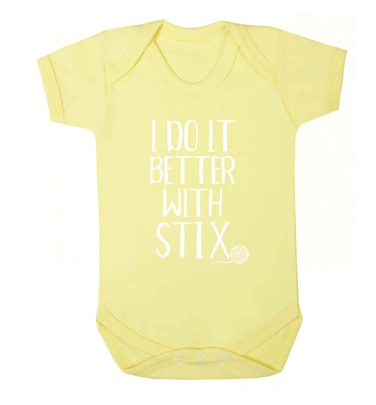 I do it better with stix (knitting) Baby Vest pale yellow 18-24 months