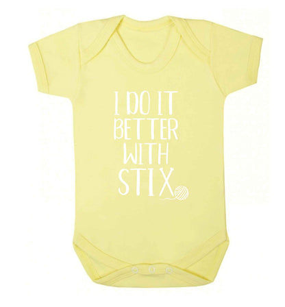 I do it better with stix (knitting) Baby Vest pale yellow 18-24 months