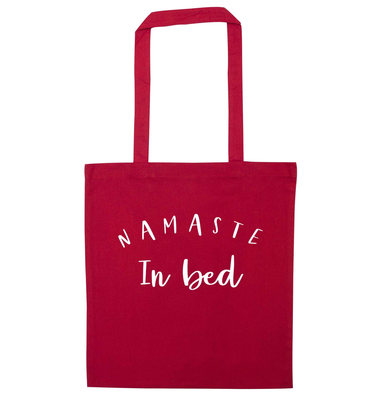 Namaste in bed red tote bag