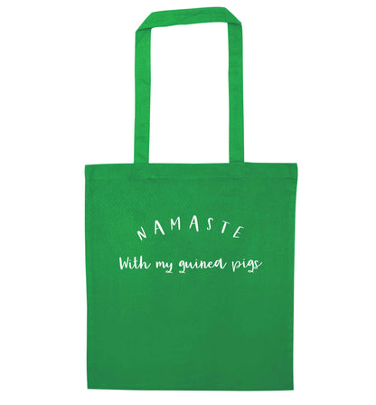 Namaste with my guinea pigs green tote bag