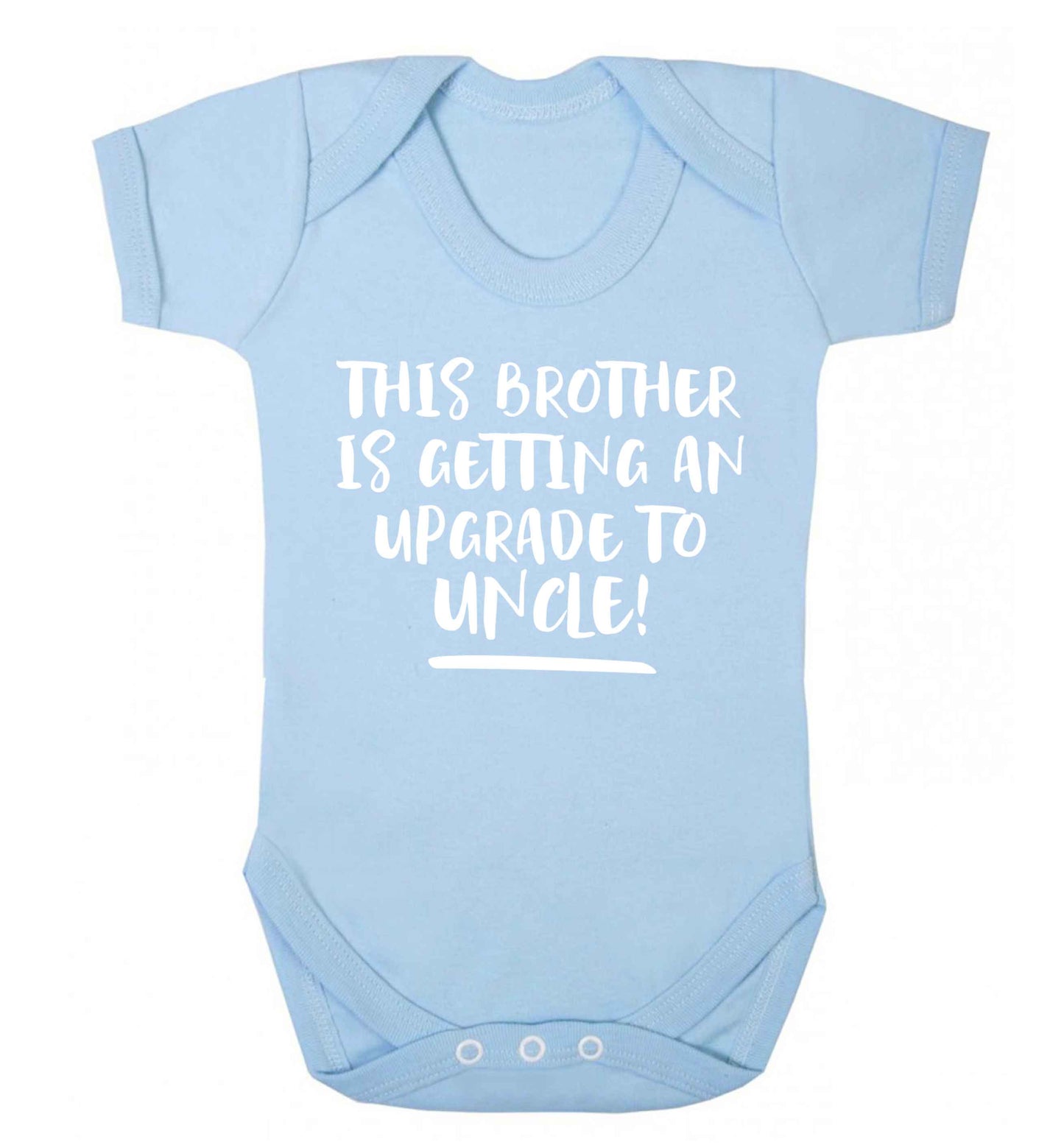 This brother is getting an upgrade to uncle! Baby Vest pale blue 18-24 months