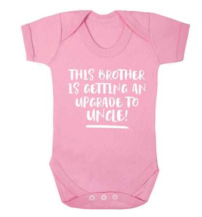 This brother is getting an upgrade to uncle! Baby Vest pale pink 18-24 months