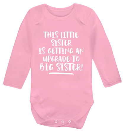 This little sister is getting an upgrade to big sister! Baby Vest long sleeved pale pink 6-12 months