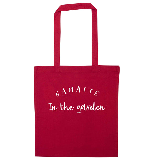 Namaste in the garden red tote bag