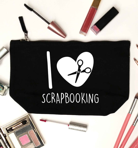 I love scrapbooking black makeup bag