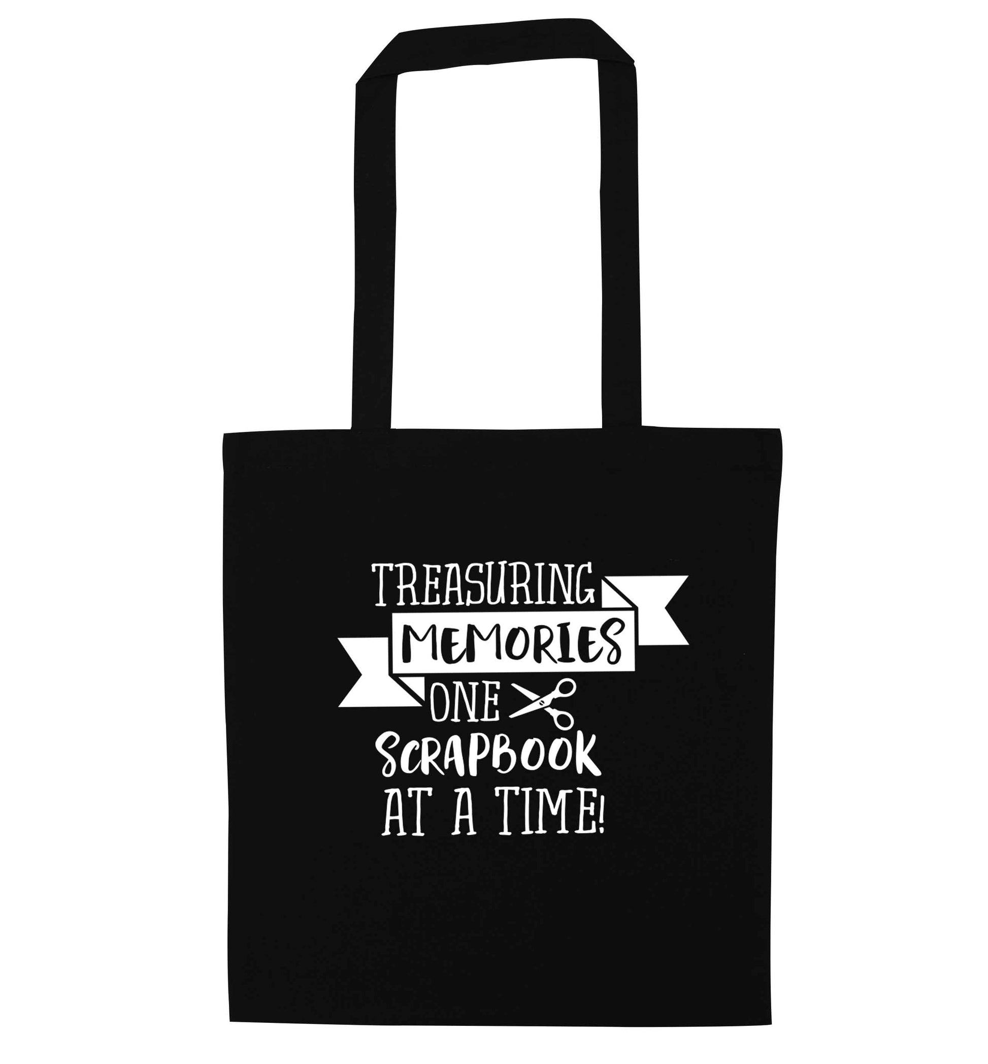 Treasuring memories one scrapbook at a time black tote bag