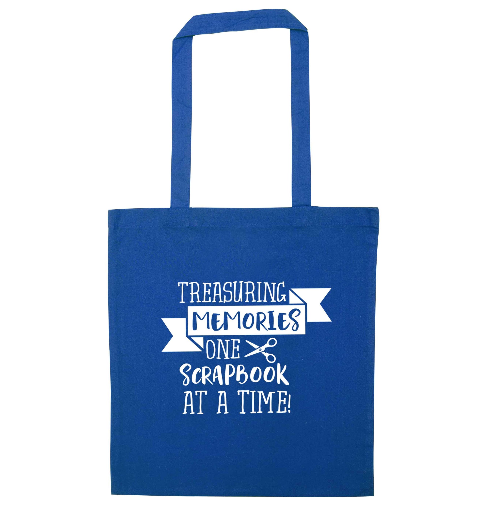Treasuring memories one scrapbook at a time blue tote bag