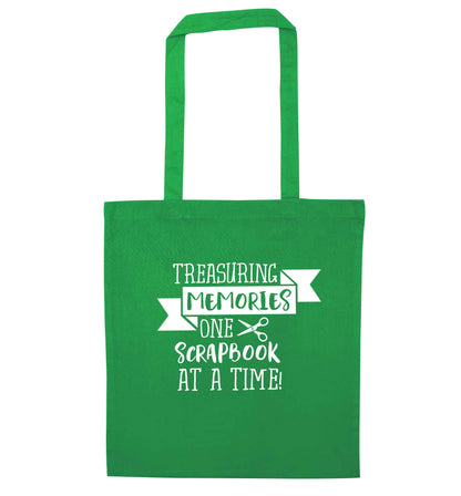 Treasuring memories one scrapbook at a time green tote bag