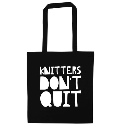 Knitters don't quit black tote bag