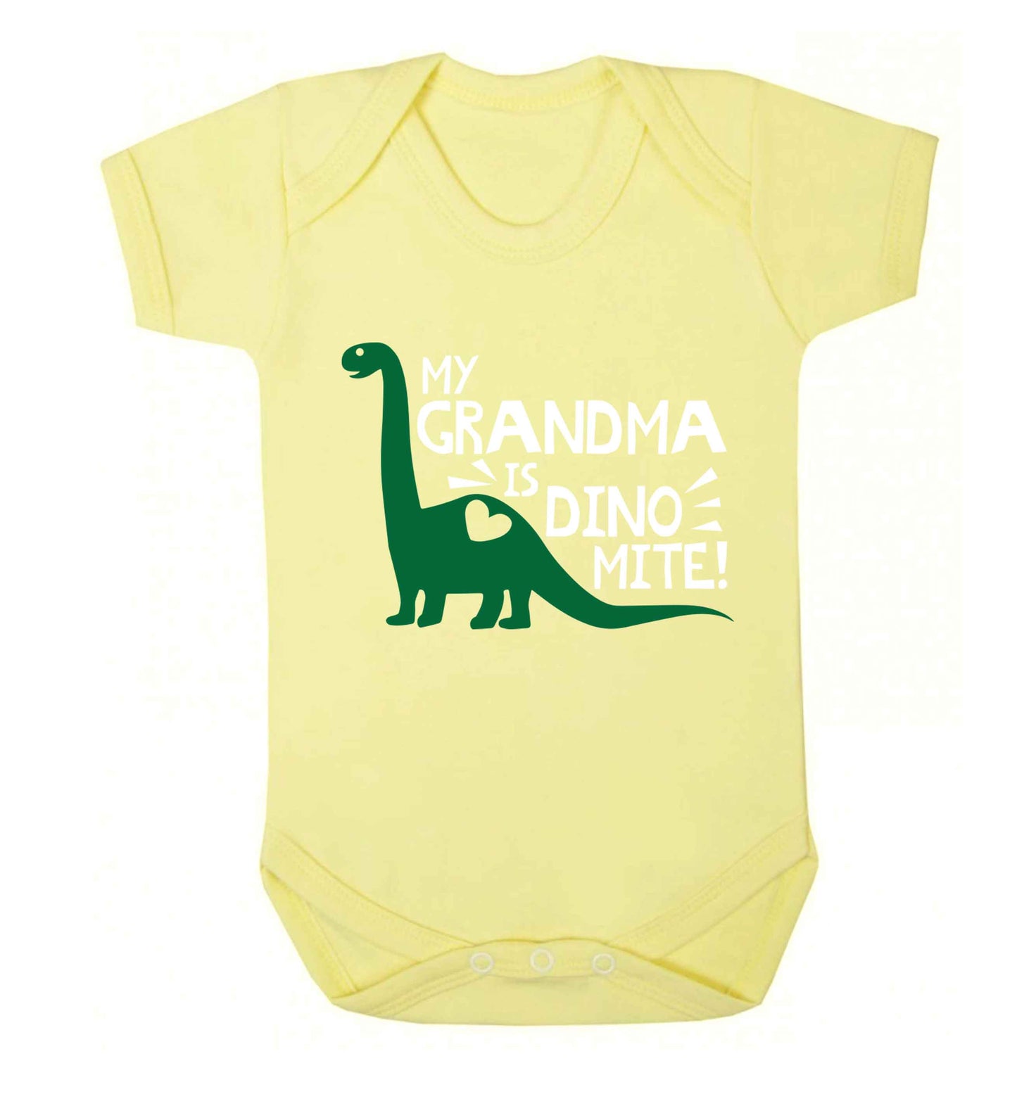 My grandma is dinomite! Baby Vest pale yellow 18-24 months