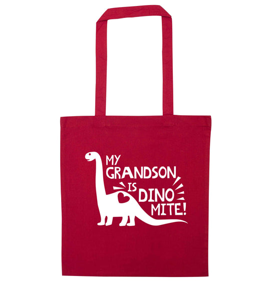 My grandson is dinomite! red tote bag