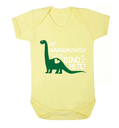 My granddaughter is dinomite! Baby Vest pale yellow 18-24 months