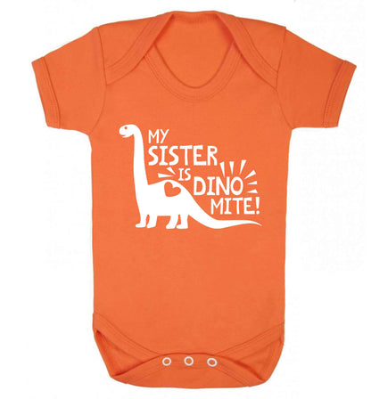 My sister is dinomite! Baby Vest orange 18-24 months