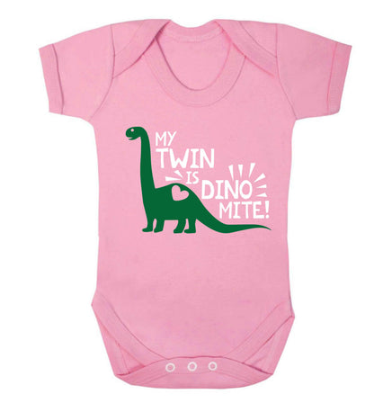 My twin is dinomite! Baby Vest pale pink 18-24 months