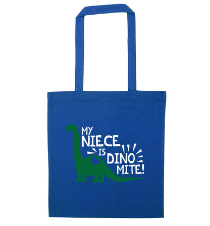 My niece is dinomite! blue tote bag