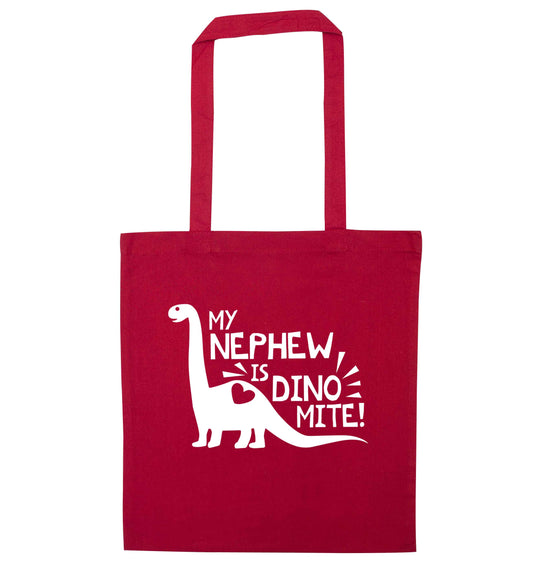 My nephew is dinomite! red tote bag