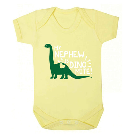 My nephew is dinomite! Baby Vest pale yellow 18-24 months