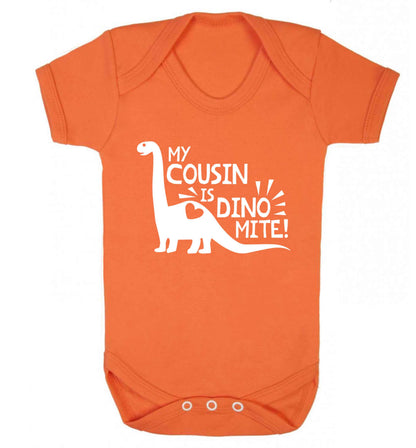 My cousin is dinomite! Baby Vest orange 18-24 months
