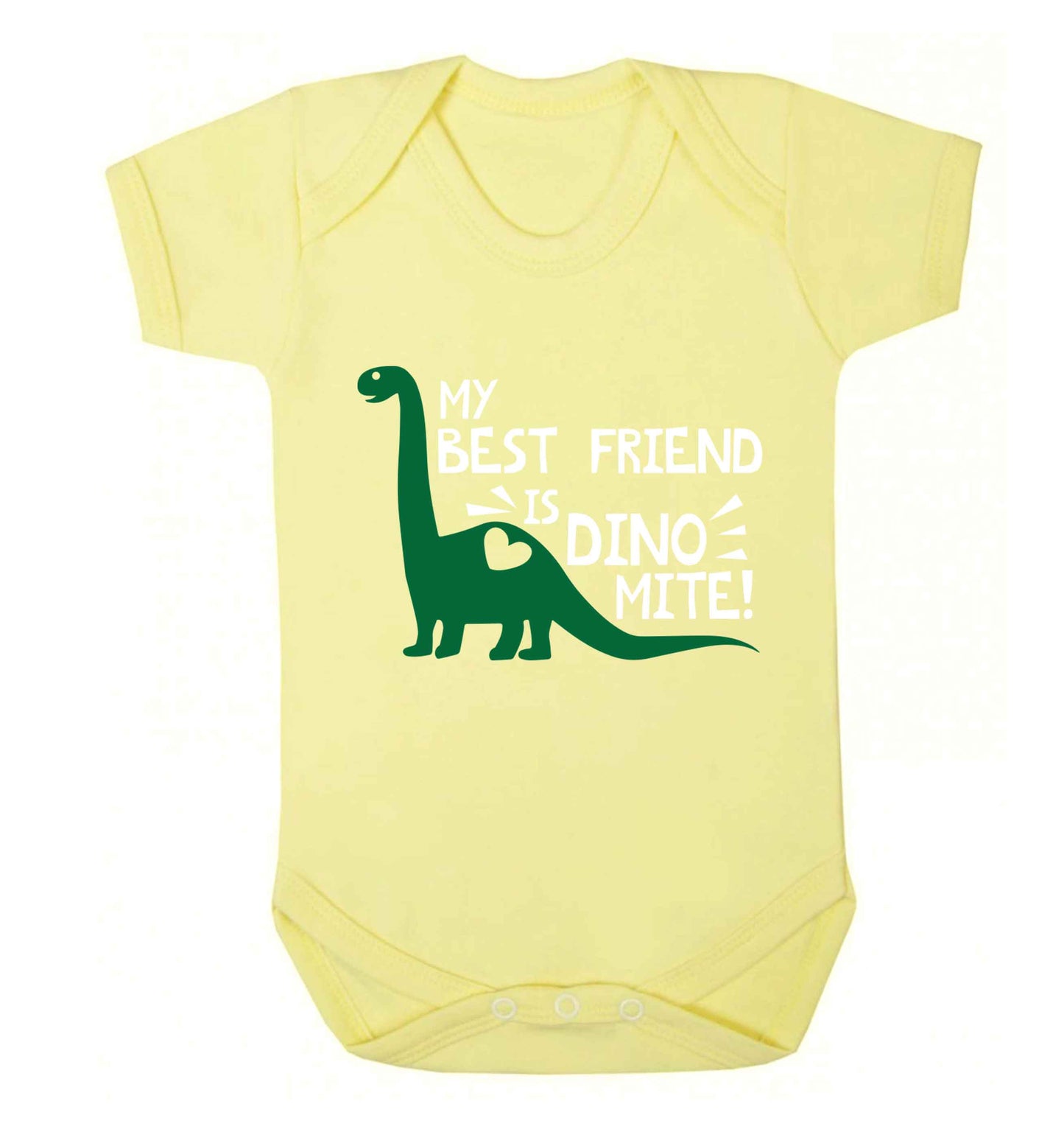 My cousin is dinomite! Baby Vest pale yellow 18-24 months