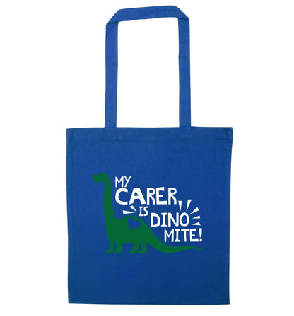 My carer is dinomite! blue tote bag