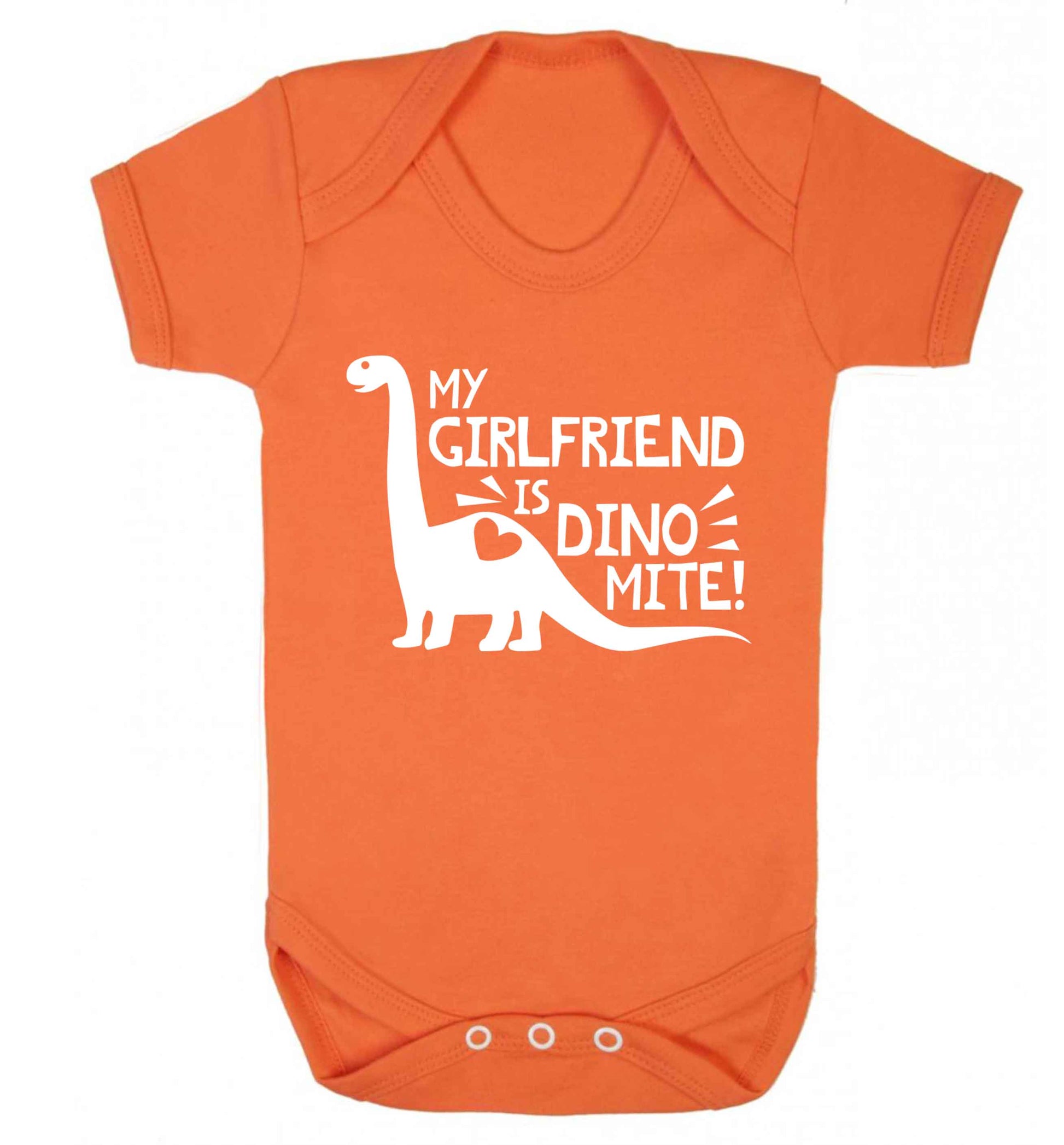 My girlfriend is dinomite! Baby Vest orange 18-24 months