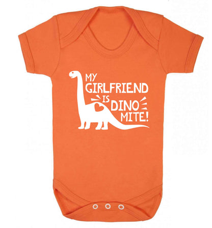My girlfriend is dinomite! Baby Vest orange 18-24 months