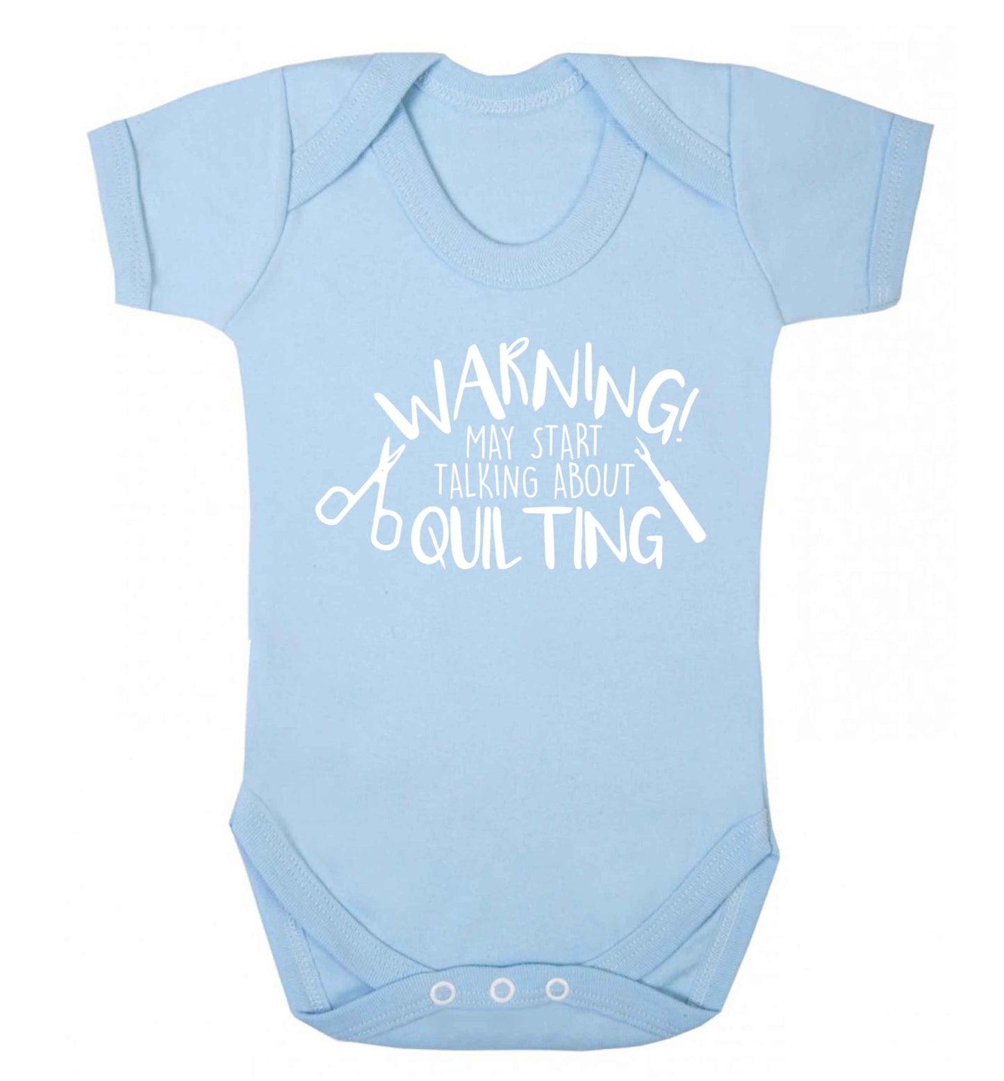 Warning may start talking about quilting Baby Vest pale blue 18-24 months
