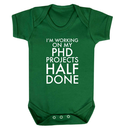 I'm working on my PHD projects half done Baby Vest green 18-24 months